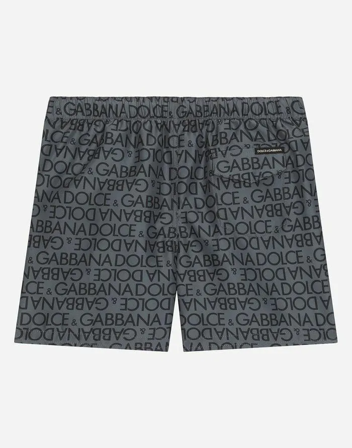 Dolce and Gabbana Beachwear Children Swim Trunks With Allover Logo Print Grey Dolce and Gabbana Beachwear Children Swim Trunks With Allover Logo Print Grey
