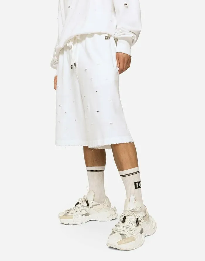 Dolce and Gabbana Trousers And Shorts Men Destroyed Jogging Shorts With DG Hardware White Dolce and Gabbana Trousers And Shorts Men Destroyed Jogging Shorts With DG Hardware White