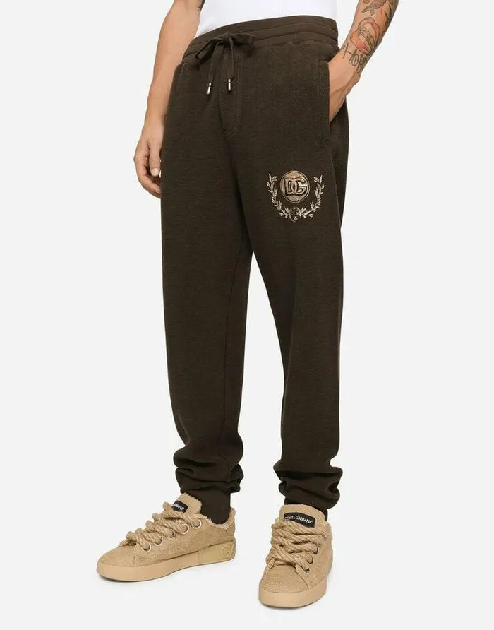 Dolce and Gabbana Trousers And Shorts Men Jersey Jogging Pants With DG Coin Print Brown Dolce and Gabbana Trousers And Shorts Men Jersey Jogging Pants With DG Coin Print Brown