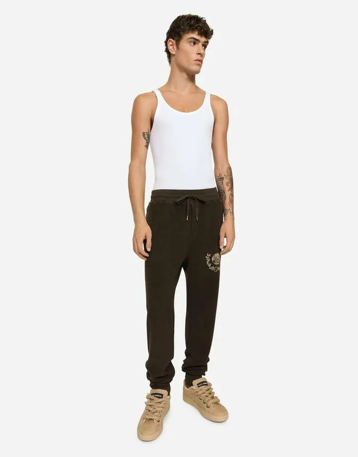 Dolce and Gabbana Trousers And Shorts Men Jersey Jogging Pants With DG Coin Print Brown Dolce and Gabbana Trousers And Shorts Men Jersey Jogging Pants With DG Coin Print Brown