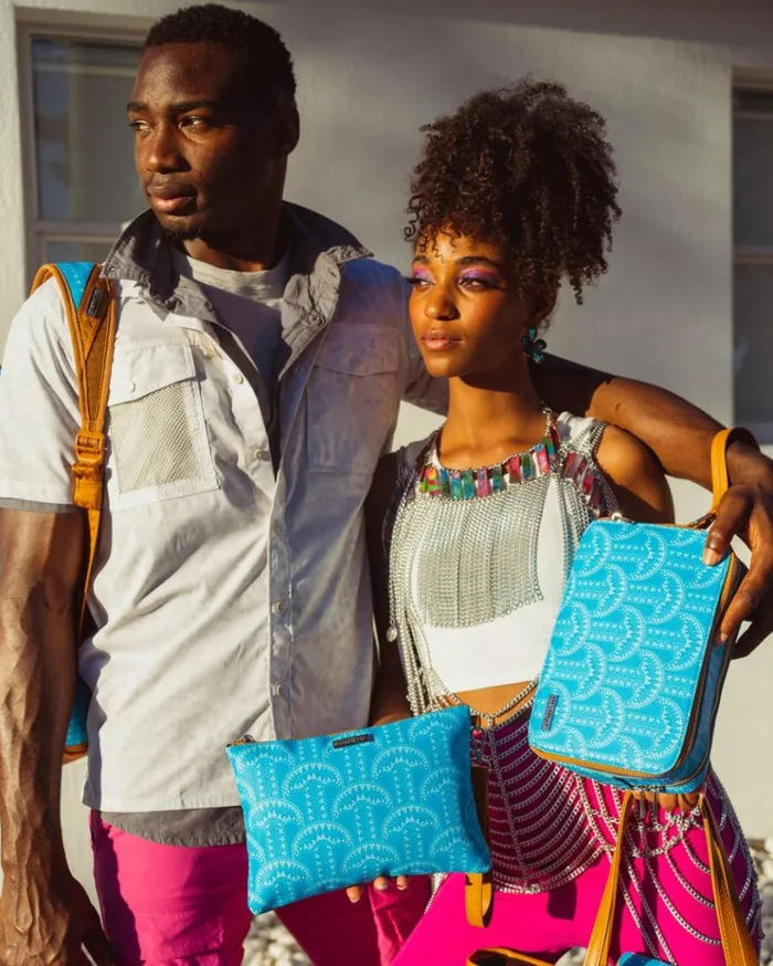 SPRAYGROUND ILLUCHAINS TURQ CROSSOVER CLUTCH Bags SPRAYGROUND ILLUCHAINS TURQ CROSSOVER CLUTCH Bags