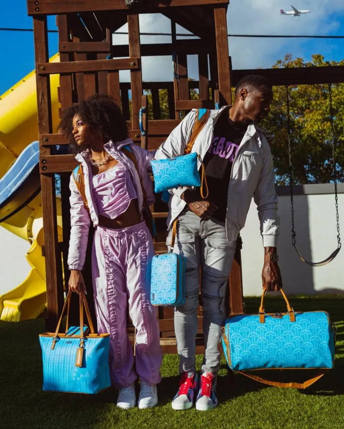 SPRAYGROUND ILLUCHAINS TURQ CROSSOVER CLUTCH Bags SPRAYGROUND ILLUCHAINS TURQ CROSSOVER CLUTCH Bags